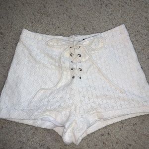 Off-white lace up shorts
